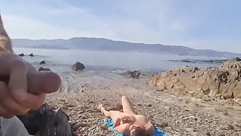 A Daring Exhibitionist Reveals His Penis To A Nudist Mother At The Beach, Who Proceeds To Perform Oral Sex On Him